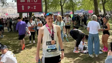 Runner with London Marathon Medal